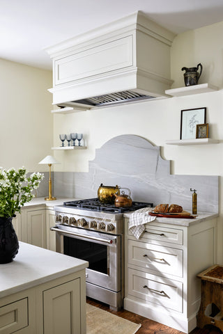 Custom chef's range and gas stove from a rustic, farmhouse kitchen design that is also sleek and timeless