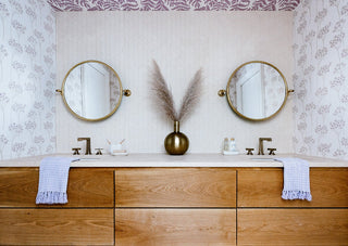 Bathroom styling with wallpaper on walls and ceiling.